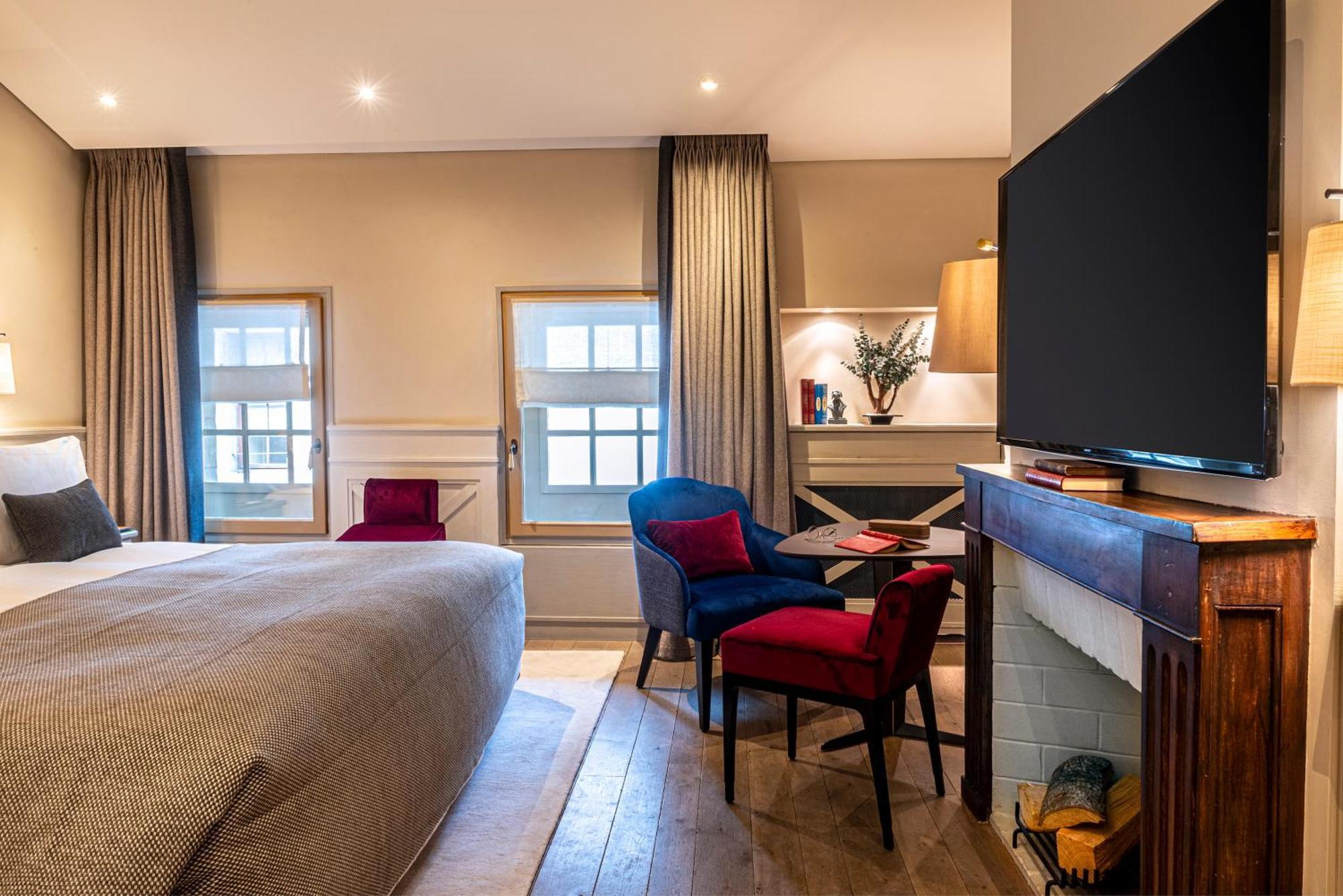Hotel Les Armures Genf Exterior foto A room at the hotel